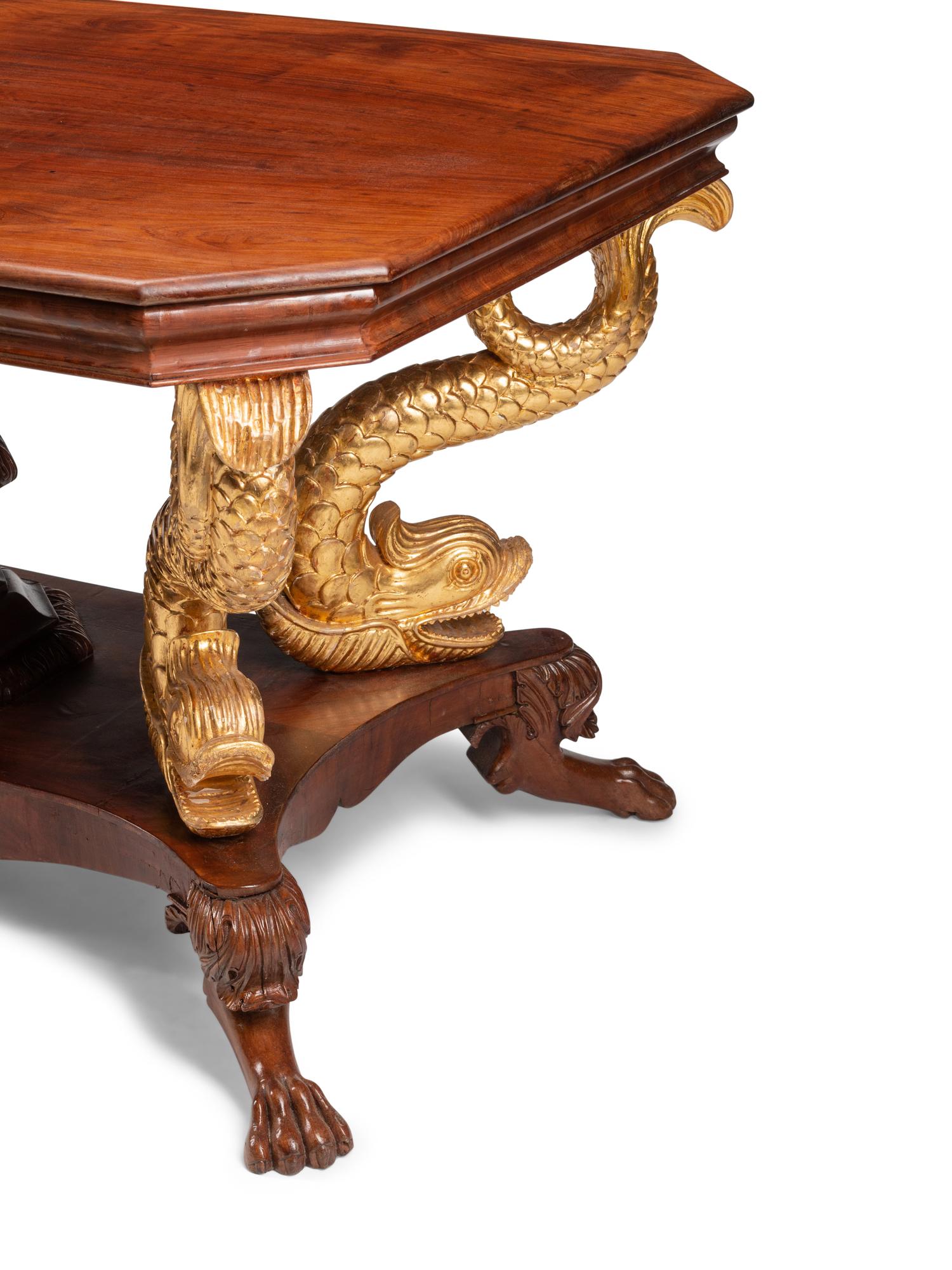A North European Neoclassical Parcel Gilt Mahogany Center Table