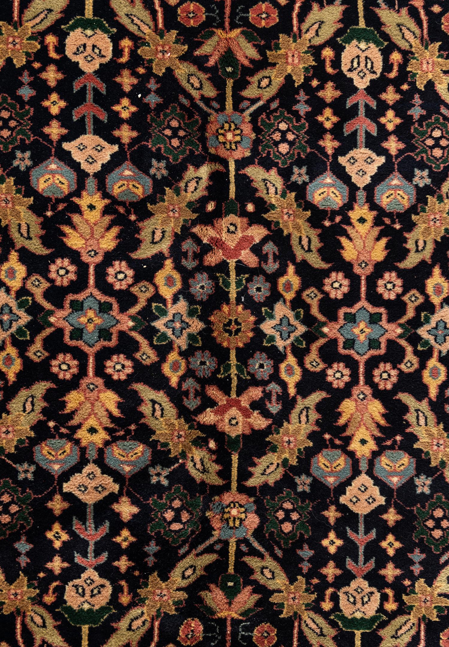 An Indo Tabriz Wool Rug