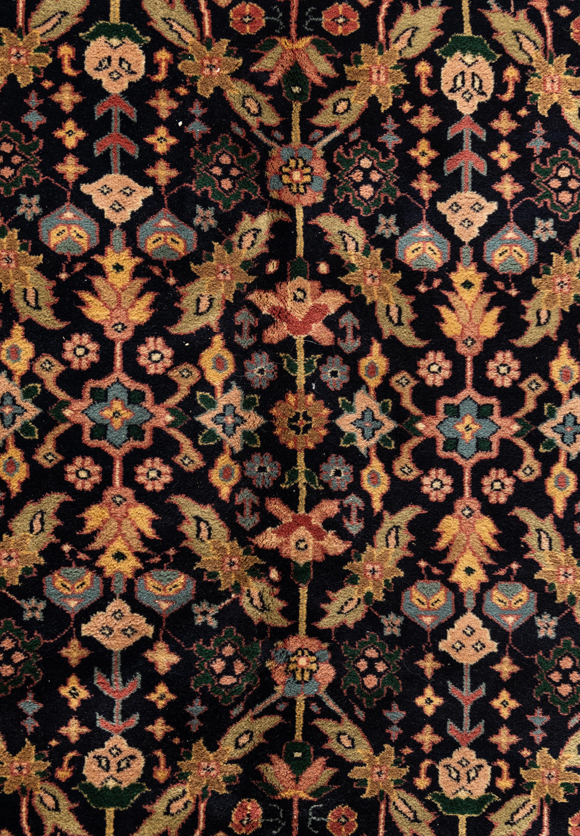 An Indo Tabriz Wool Rug