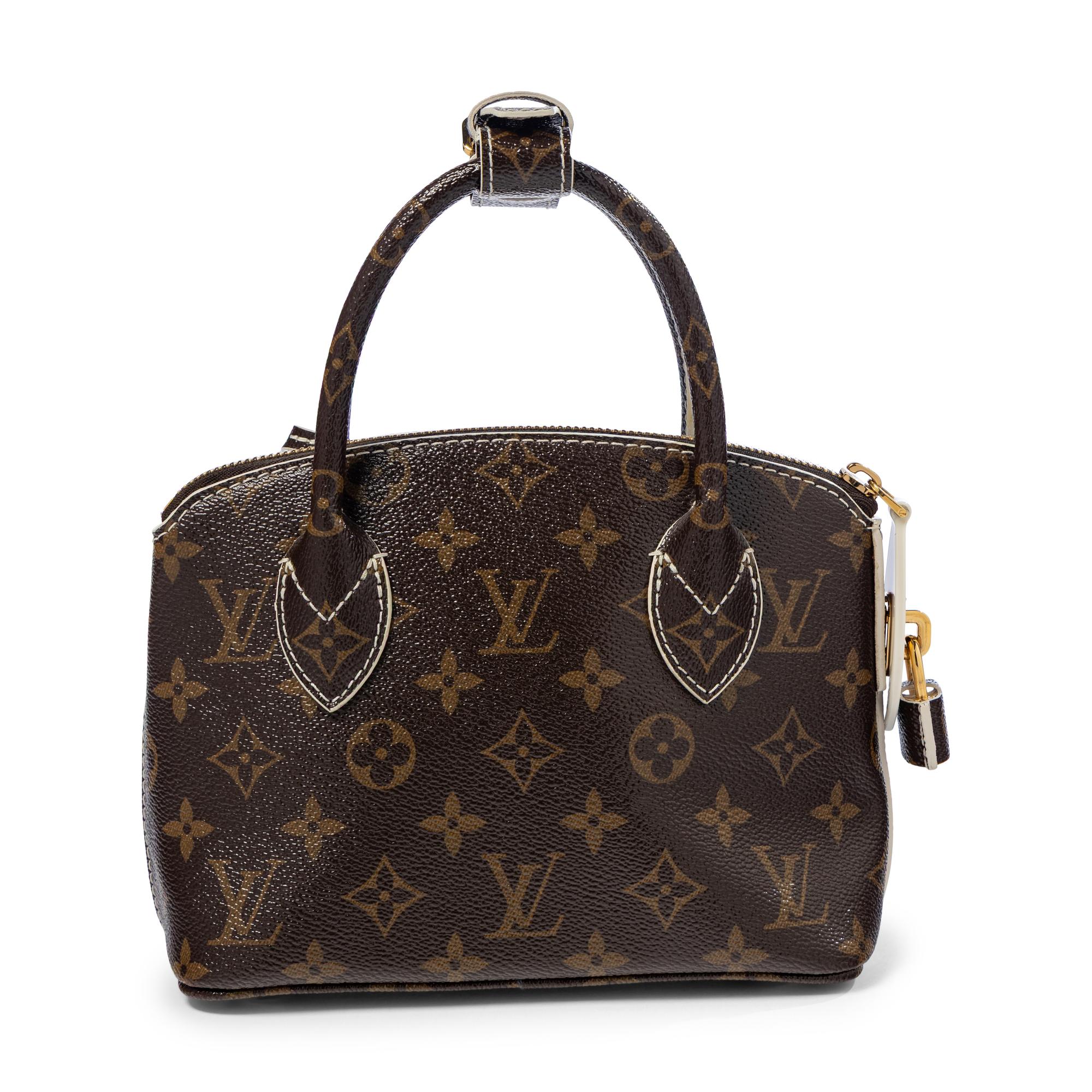 LOUIS VUITTON, MONOGRAM FETISH LOCKIT HANDBAG