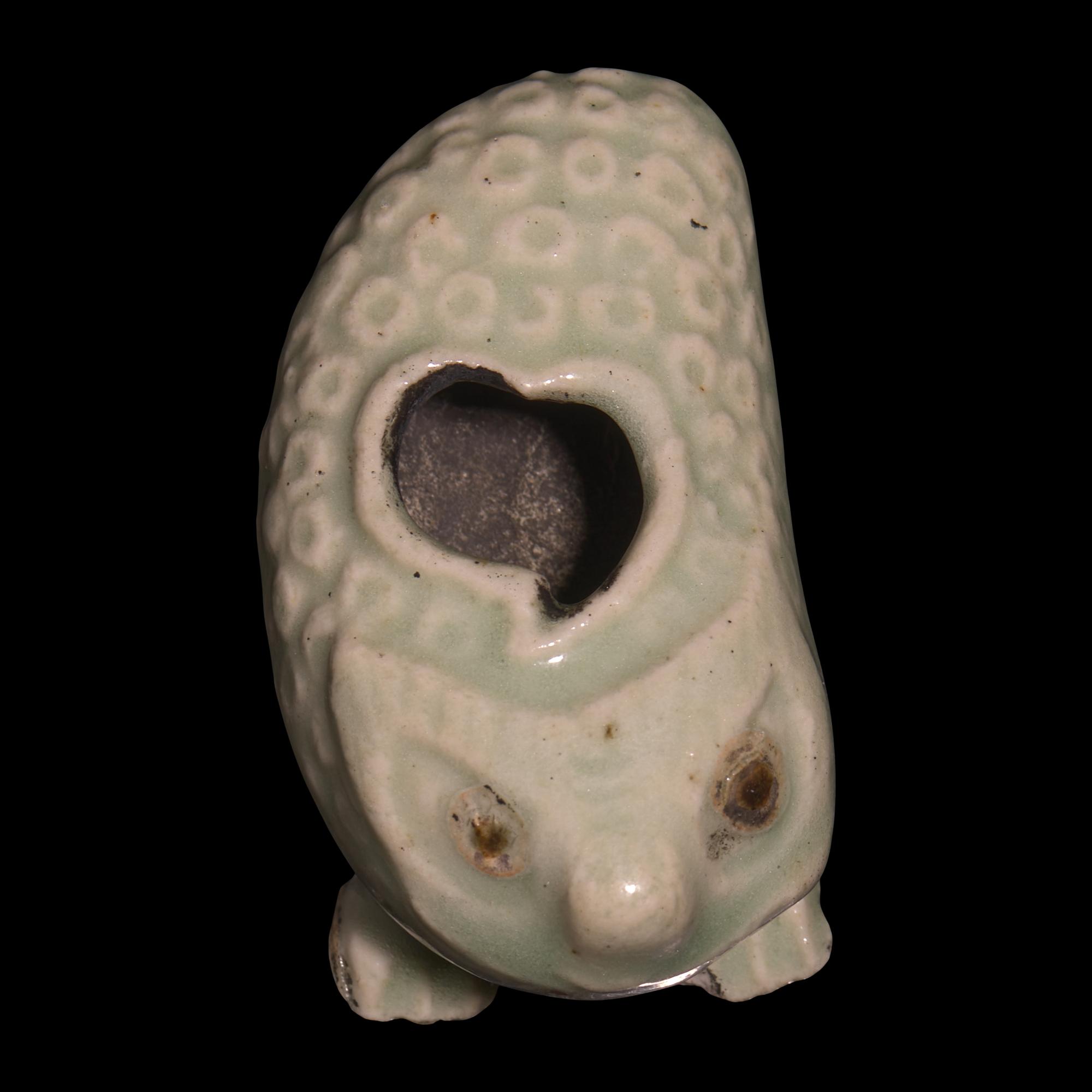 A Chinese Pale Blue Glazed Three-Legged Toad, Yuan/Ming Dynasty or Earlier — 元明或更早 青釉金蟾