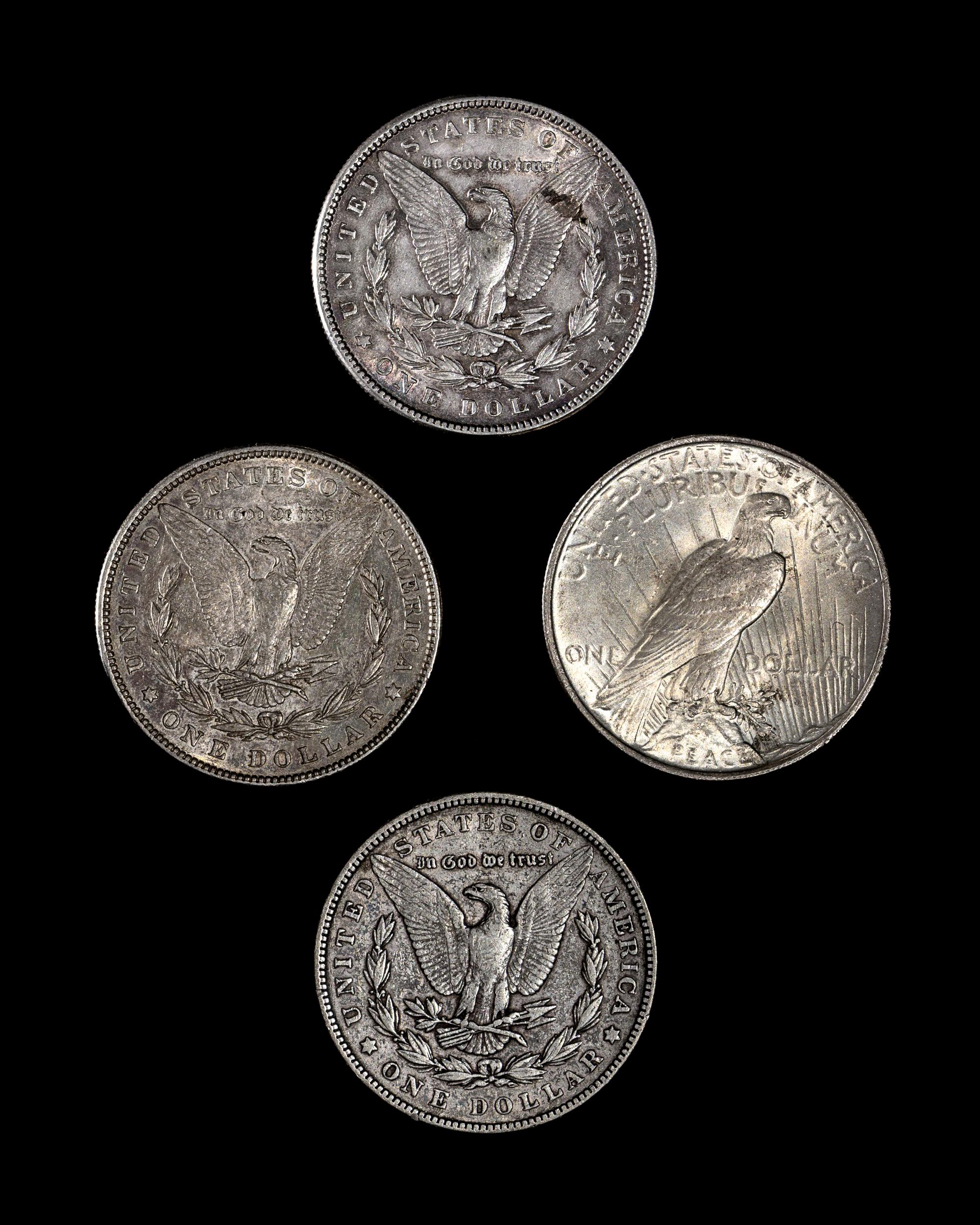 A Group of Three United States Morgan Silver $1 Coins