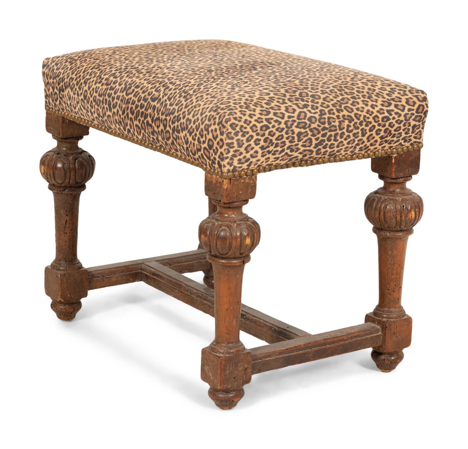 A Louis XIV Carved Walnut Tabouret with Leopard Print Upholstery