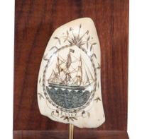 A Pair of Robert Spring Scrimshaw Whale's Teeth