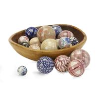 Turned wood bowl with collection of twenty-four glazed Staffordshire and polished stone carpet balls The carpet balls Scottish or English, 19th century