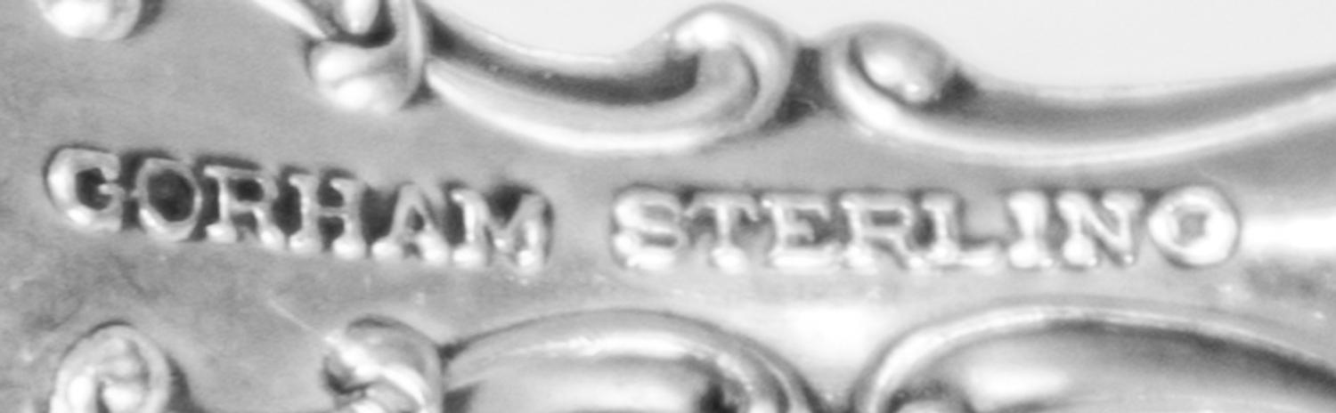 An American Silver Flatware Service, Gorham Mfg. Co., Providence, RI, Strasbourg pattern, comprising: 12 dinner knives 12 butter speade
