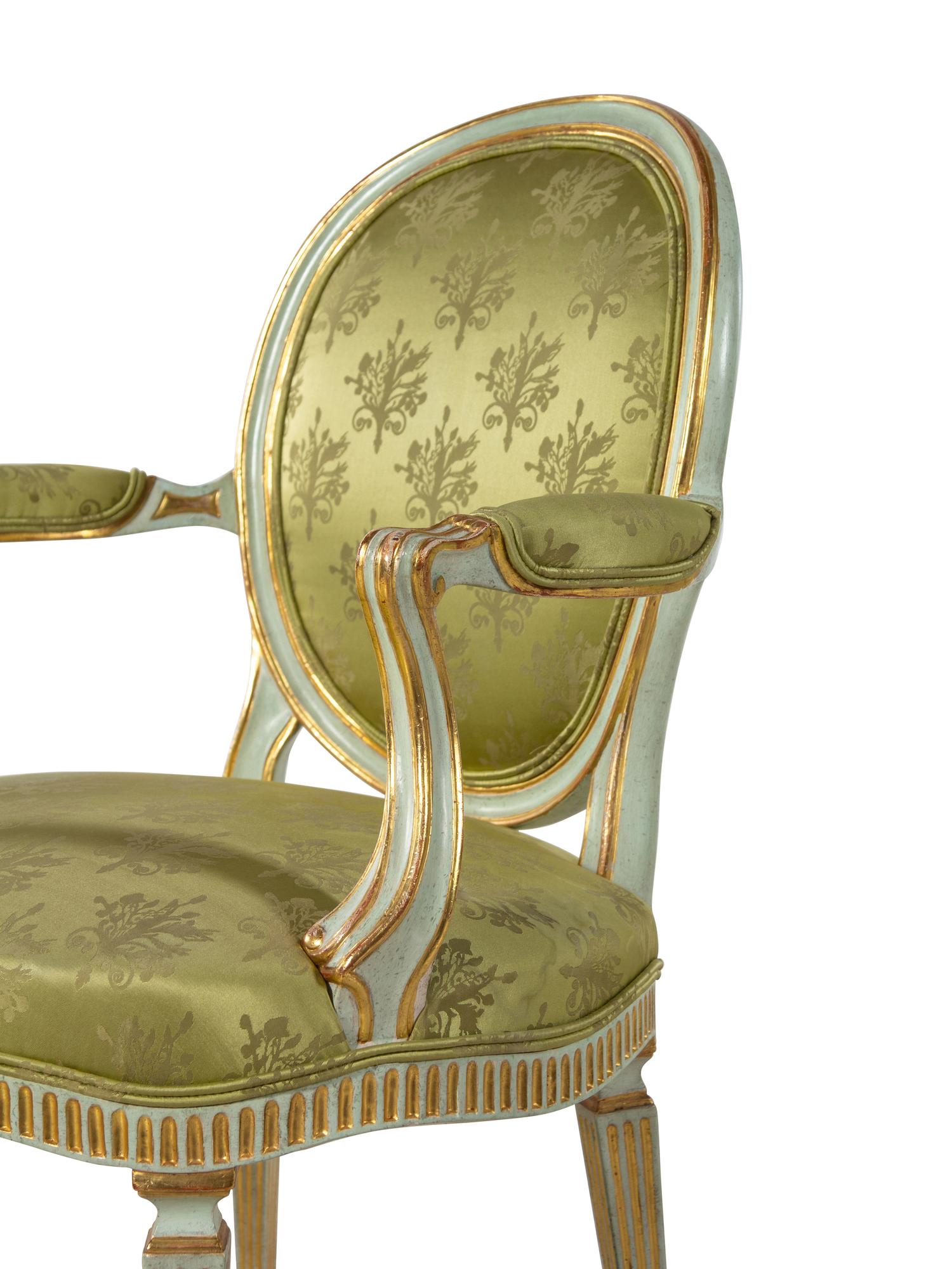 A Pair of Italian Painted and Parcel Gilt Armchairs