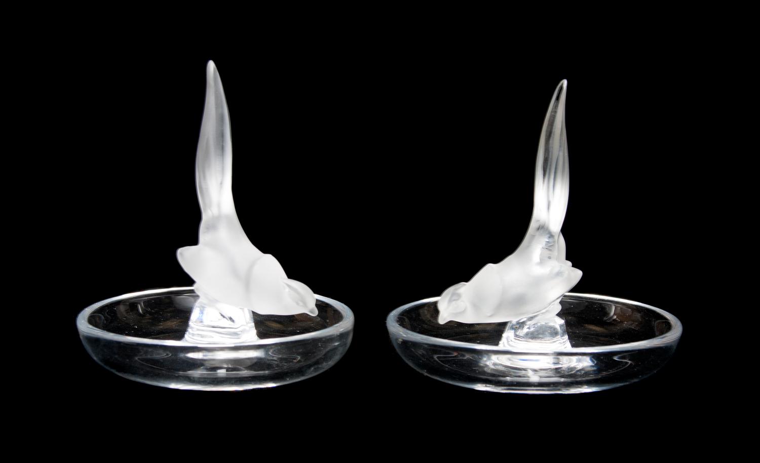 A Pair of Lalique Molded and Frosted Glass Ring Trays Height 4 x diameter 3 3/4 inches.