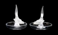 A Pair of Lalique Molded and Frosted Glass Ring Trays Height 4 x diameter 3 3/4 inches.