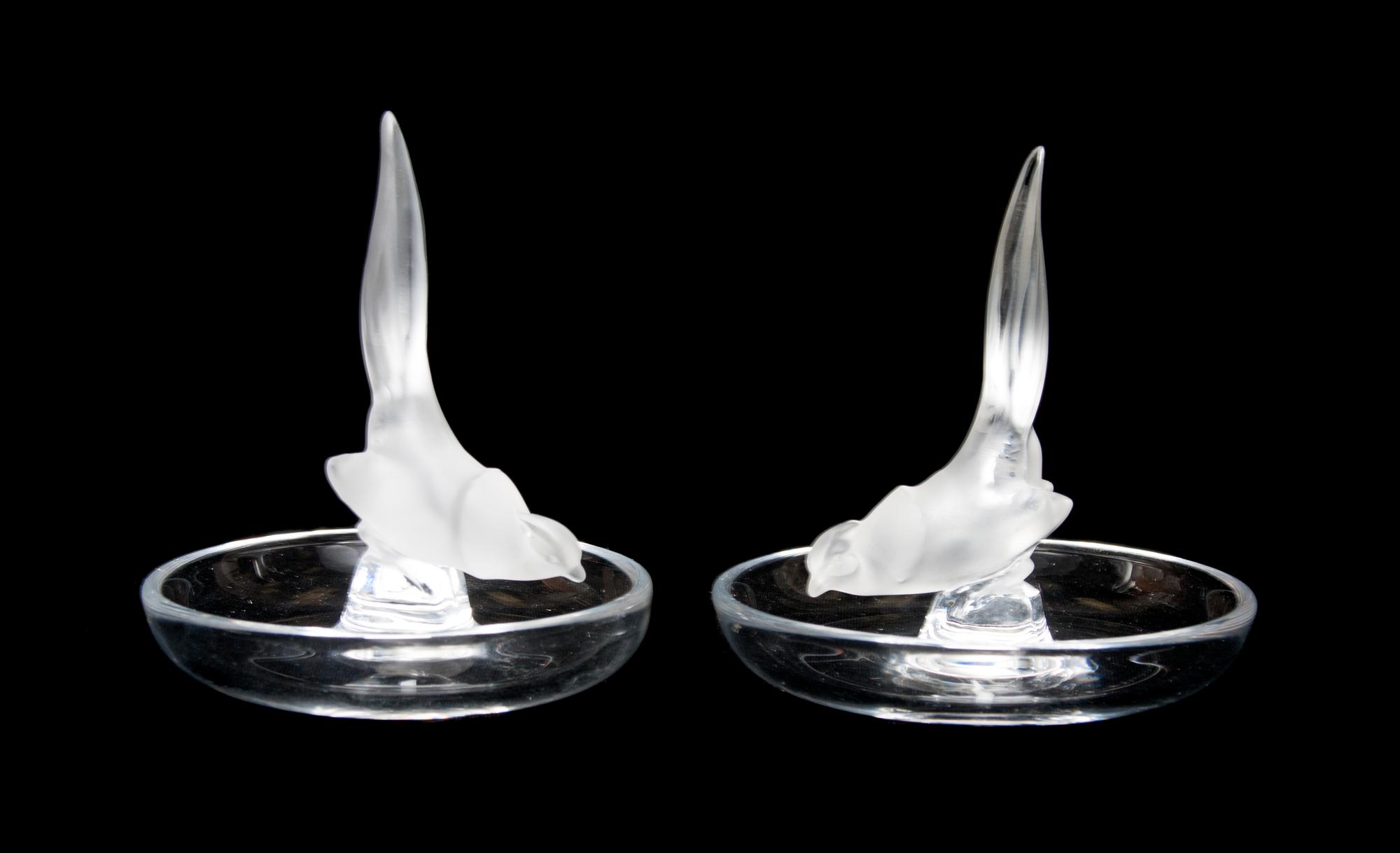 A Pair of Lalique Molded and Frosted Glass Ring Trays Height 4 x diameter 3 3/4 inches.