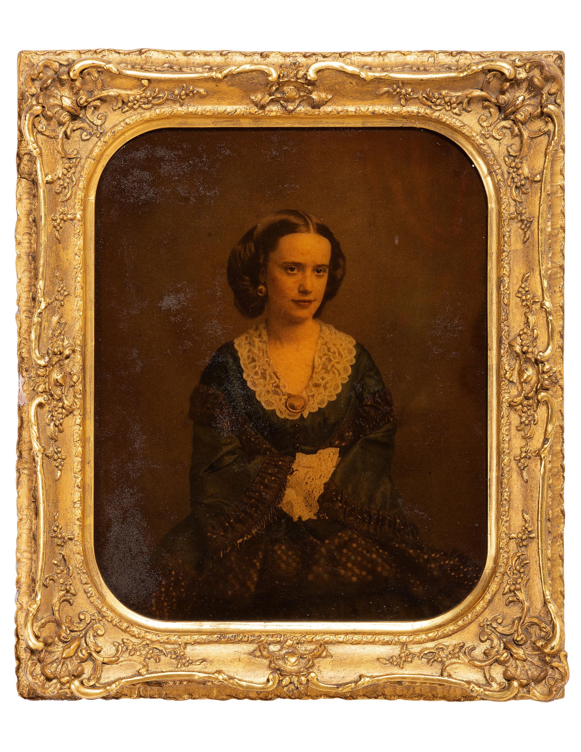 [EARLY PHOTOGRAPHY]. Large ivorytype portrait of a beautiful woman wearing a cameo.