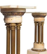 A Pair of Continental Gilt Bronze Mounted Onyx Pedestals