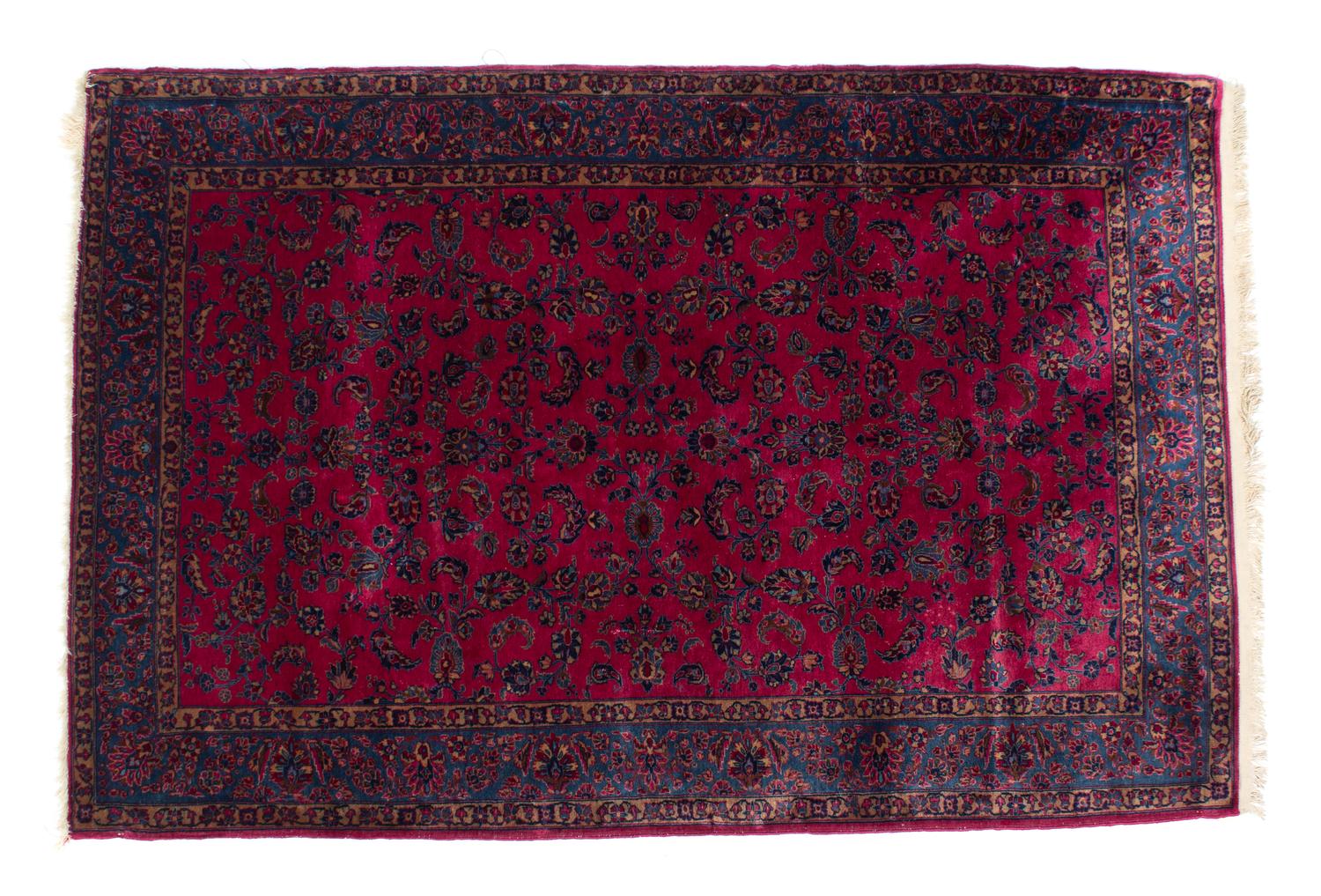 A Sarouk Wool Rug 75 1/2 x 52 1/2 inches. — 20TH CENTURY