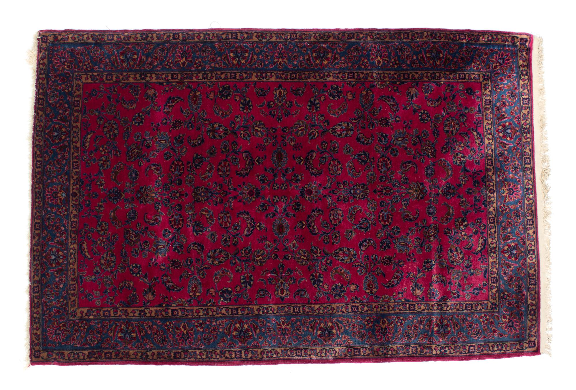 A Sarouk Wool Rug 75 1/2 x 52 1/2 inches. — 20TH CENTURY