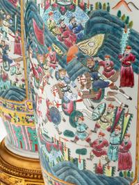 A Pair of Monumental Famille Jaune Porcelain Vases on Giltwood Stands