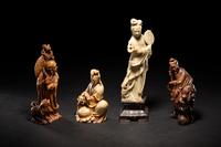 Four Chinese Carved Soapstone Figures of Immortals