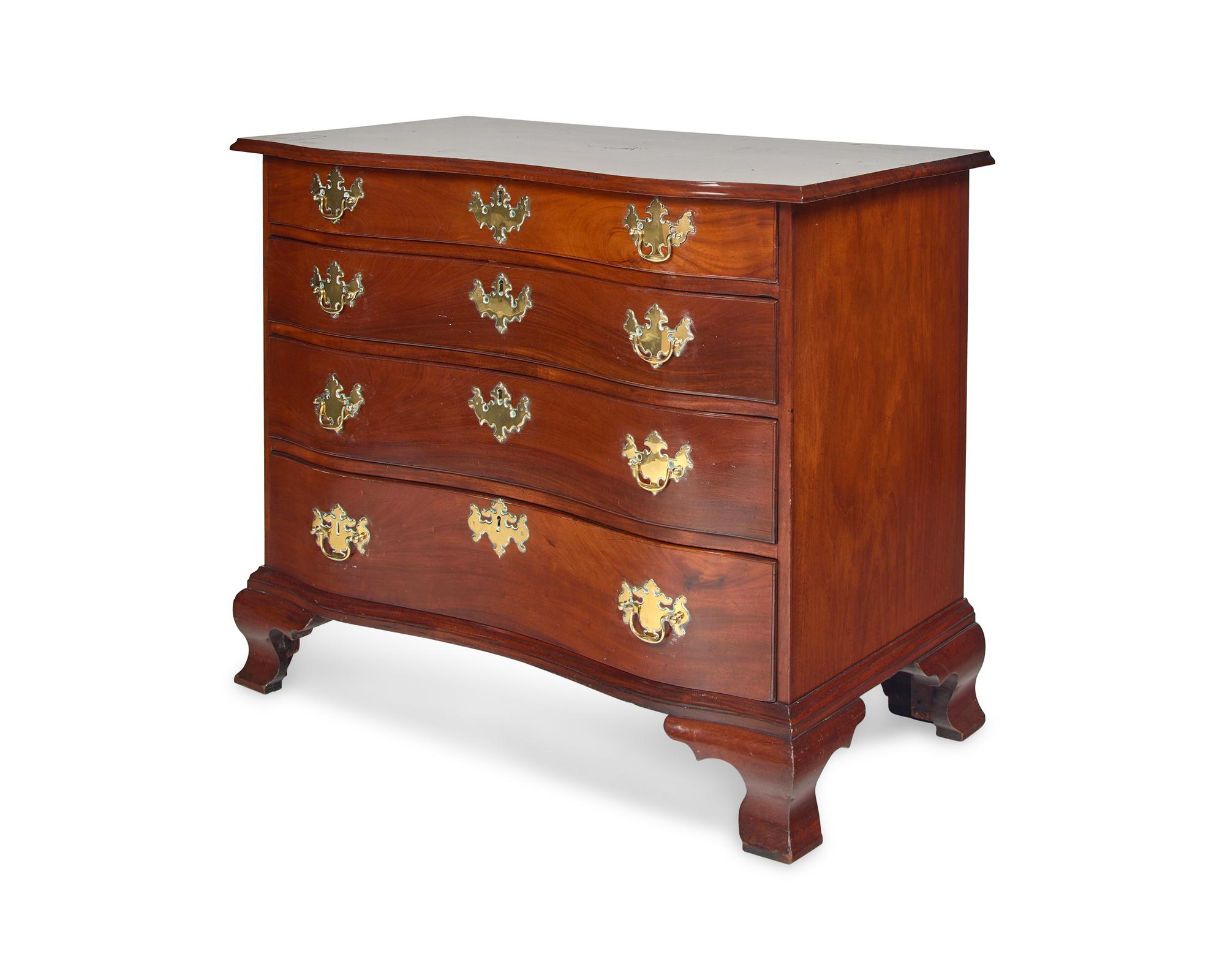 A Chippendale Mahogany Reverse-Serpentine Chest of Drawers