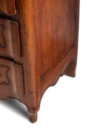 A Louis XV Provincial Walnut Commode