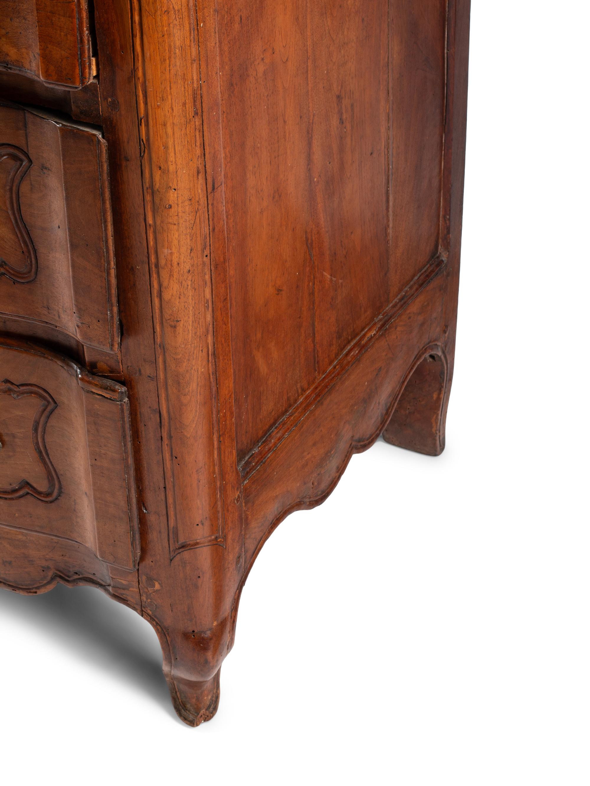 A Louis XV Provincial Walnut Commode