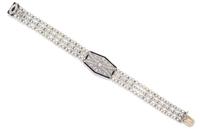 An Art Deco Platinum, Natural Pearl, Onyx and Diamond Bracelet, Georges Fouquet, 10.00 dwts.