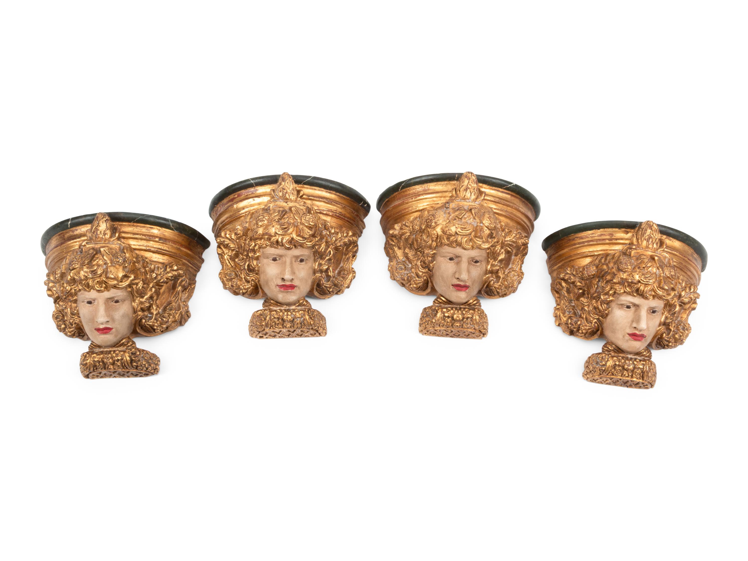 A Set of Four Italian Carved, Painted and Parcel Gilt Wall Brackets