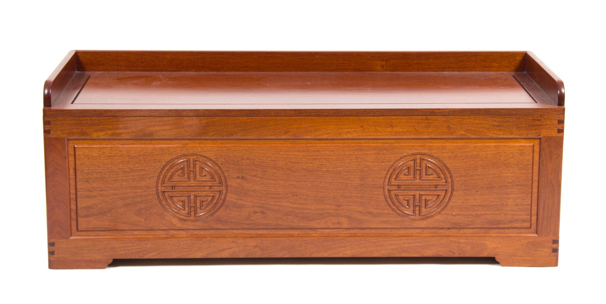 A Chinese Teak Storage Bench Height 17 1/2 x width 48 x depth 18 inches.