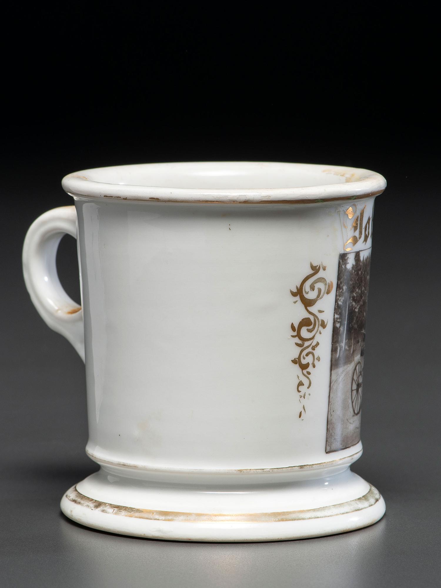 A Photographic Transfer Porcelain Shaving Mug Depicting a Man Driving a Horse and Buggy