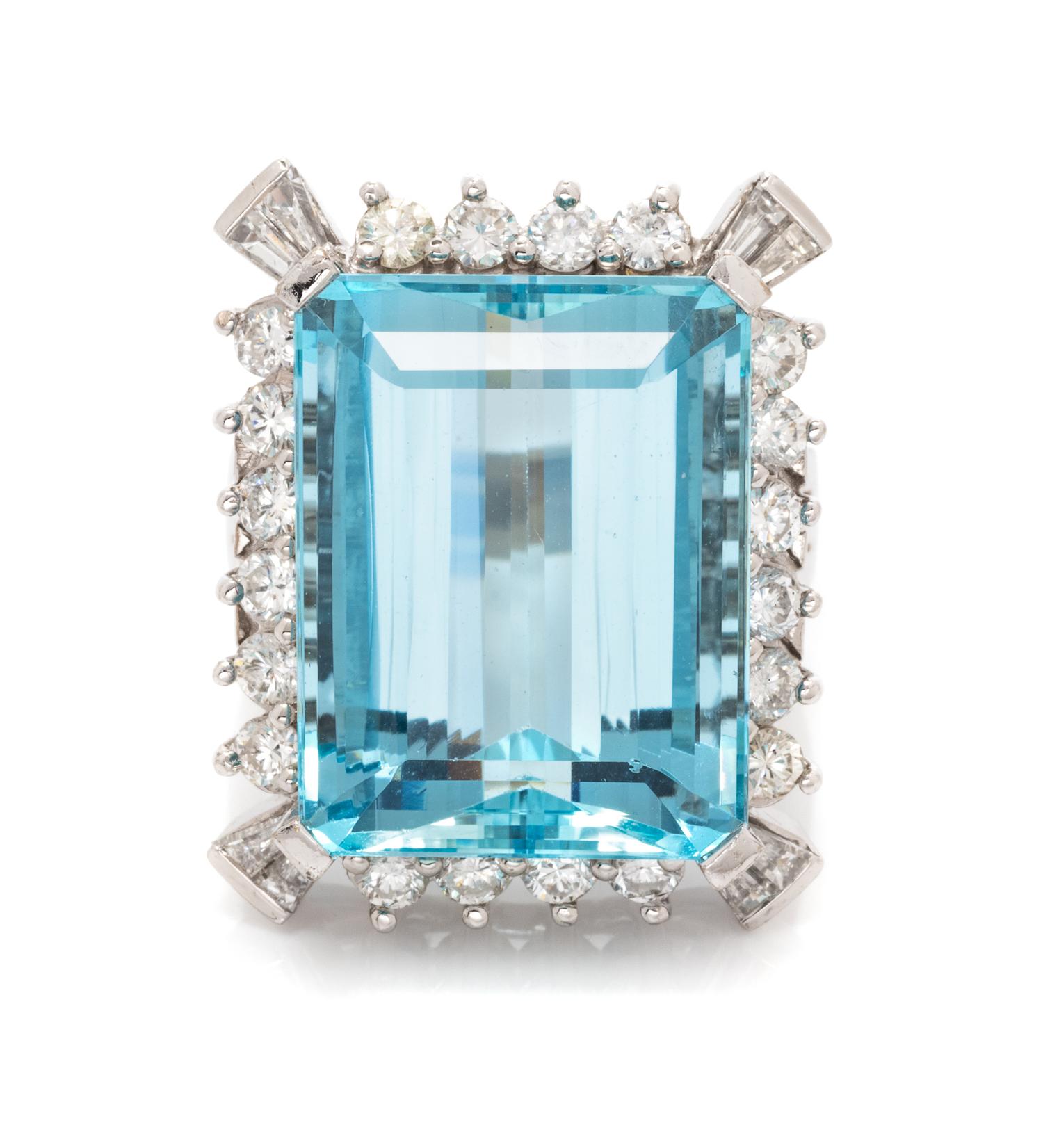 An 18 Karat White Gold, Aquamarine and Diamond Ring, 11.30 dwts.
