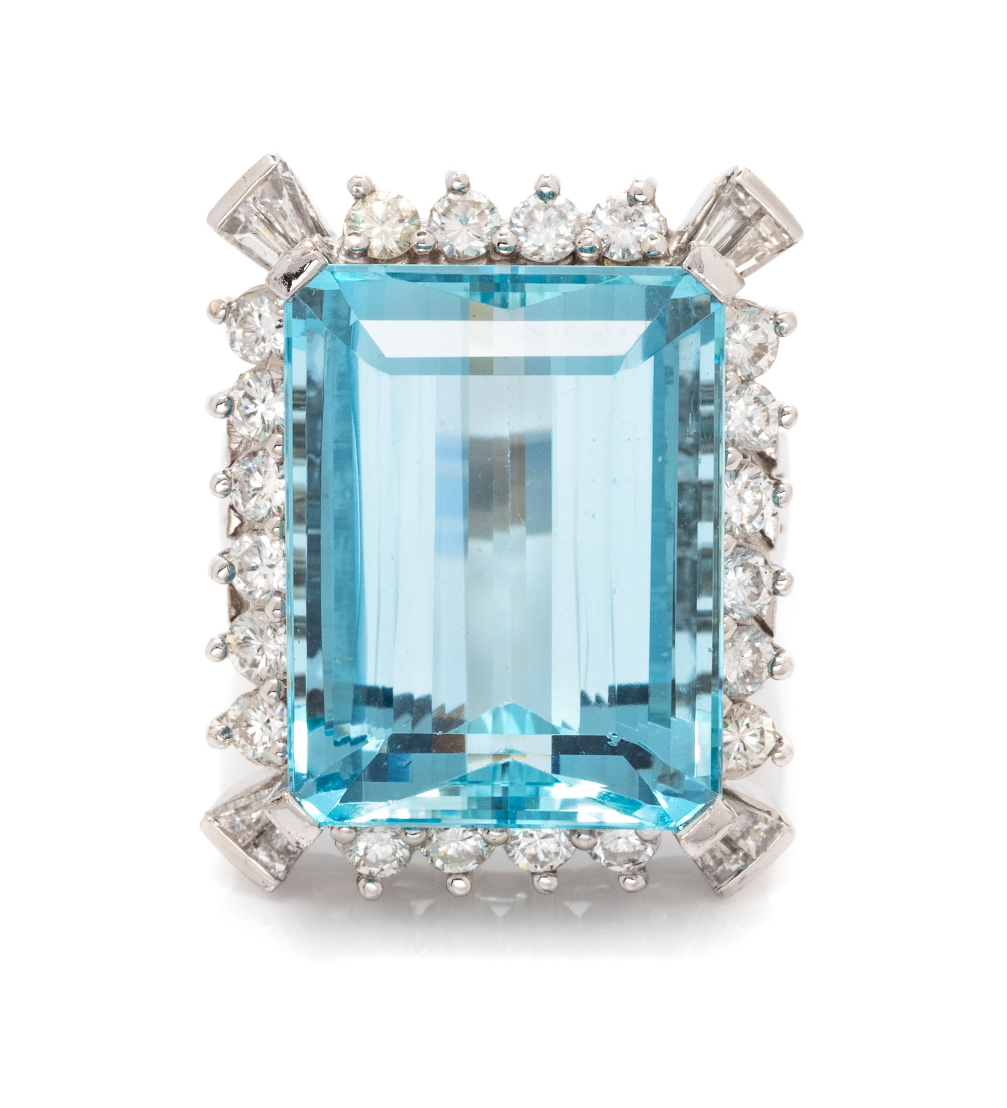 An 18 Karat White Gold, Aquamarine and Diamond Ring, 11.30 dwts.
