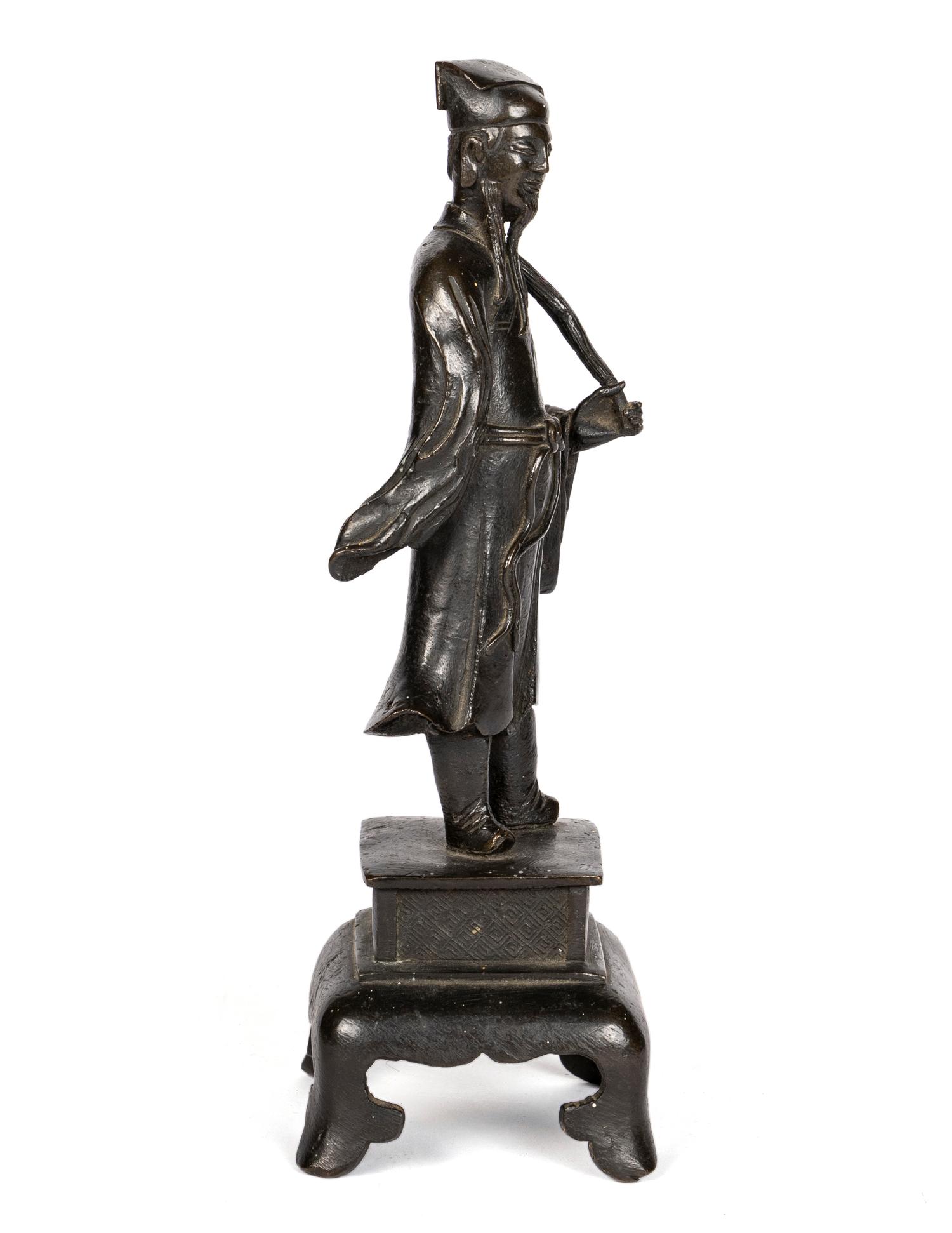 A Chinese Bronze Figure of a Daoist Immortal