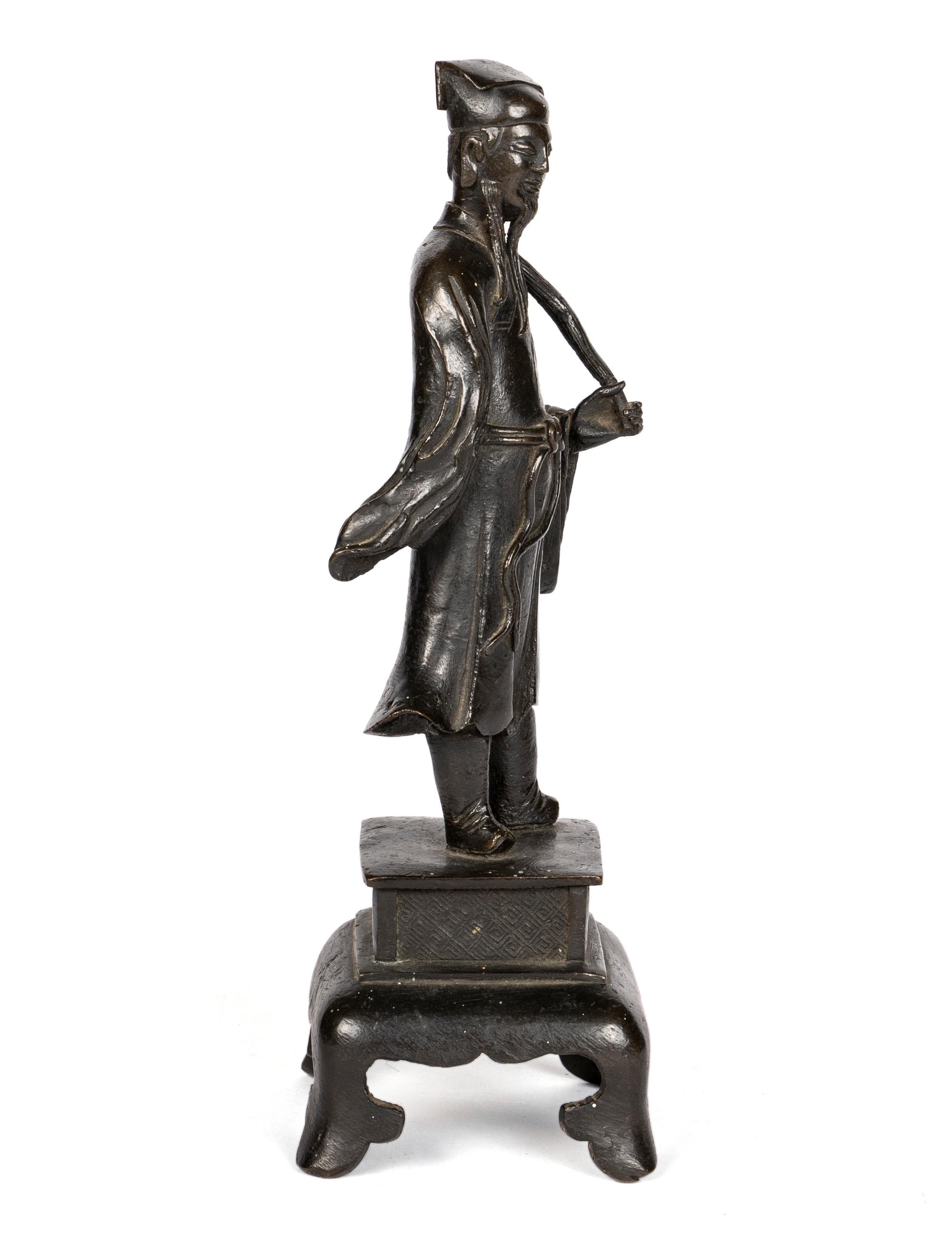 A Chinese Bronze Figure of a Daoist Immortal