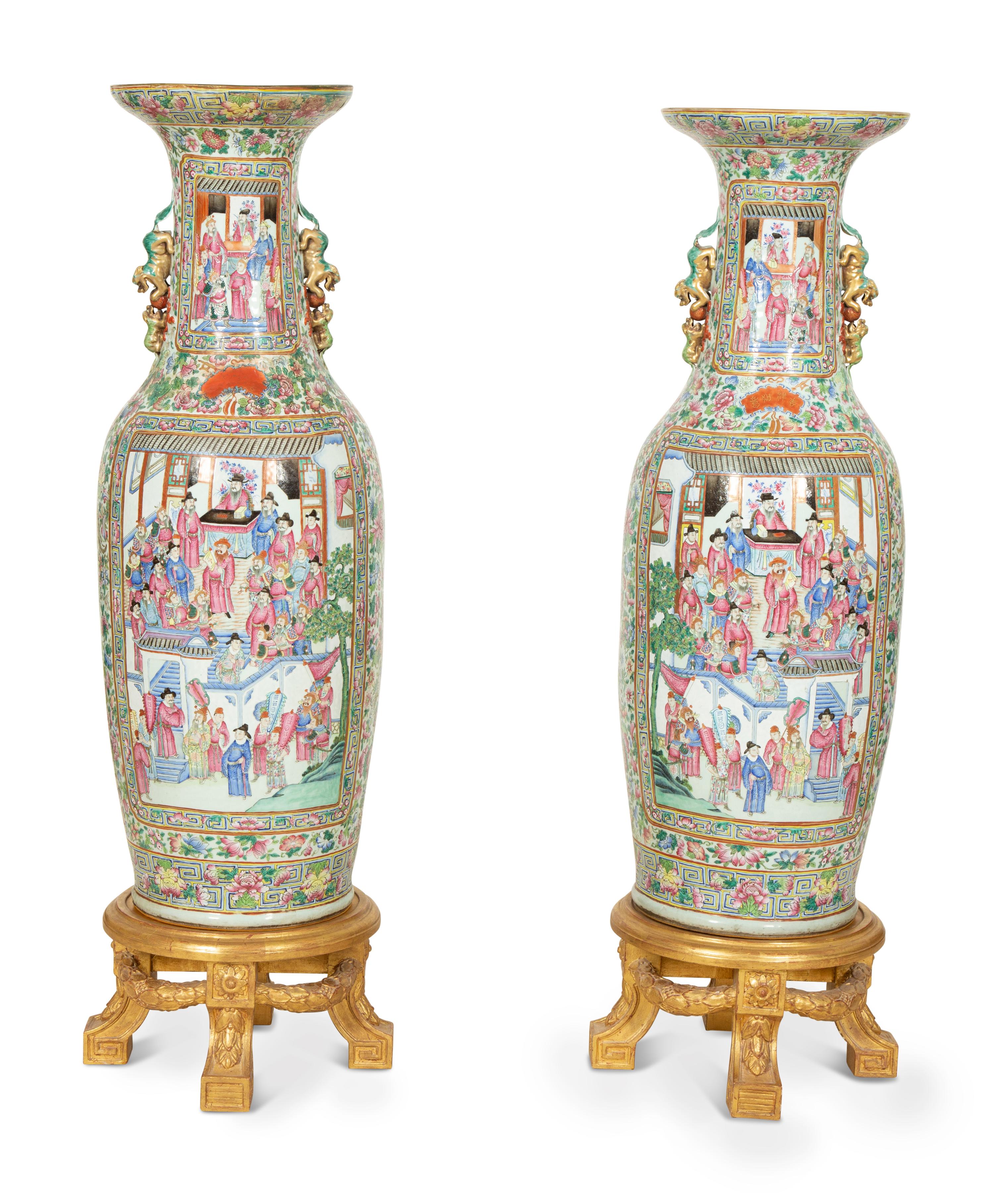 A Pair of Large Chinese Canton Style Porcelain Floor Vases on Giltwood Stands