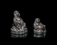 Two Silver Figures of Laughing Buddha