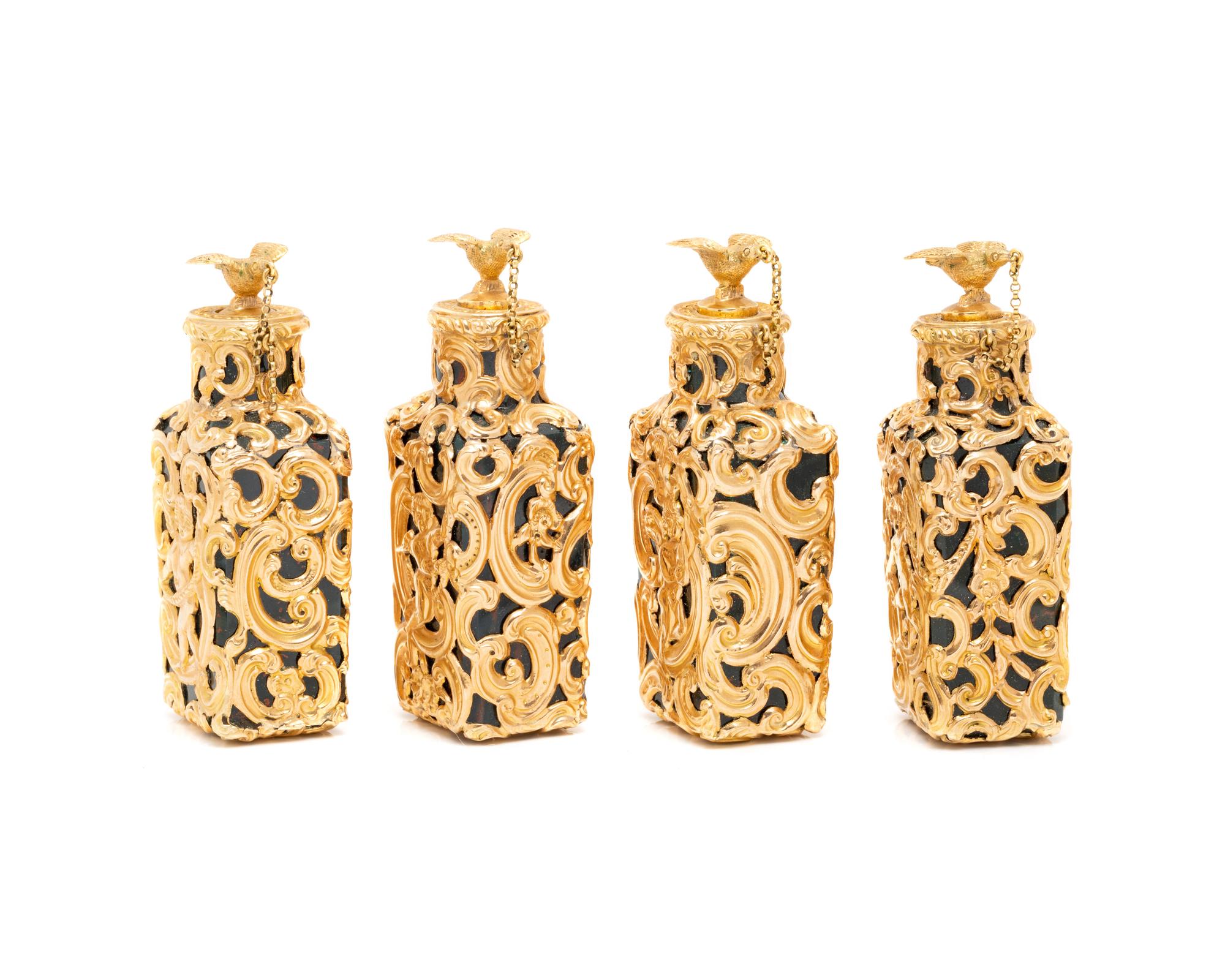 An English Gold and Diamond Mounted Carved Bloodstone Cased Scent Flask Set
