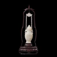 A Chinese Carved Jade Hanging Vase, 20th Century — 近代 花鳥紋玉鏈瓶