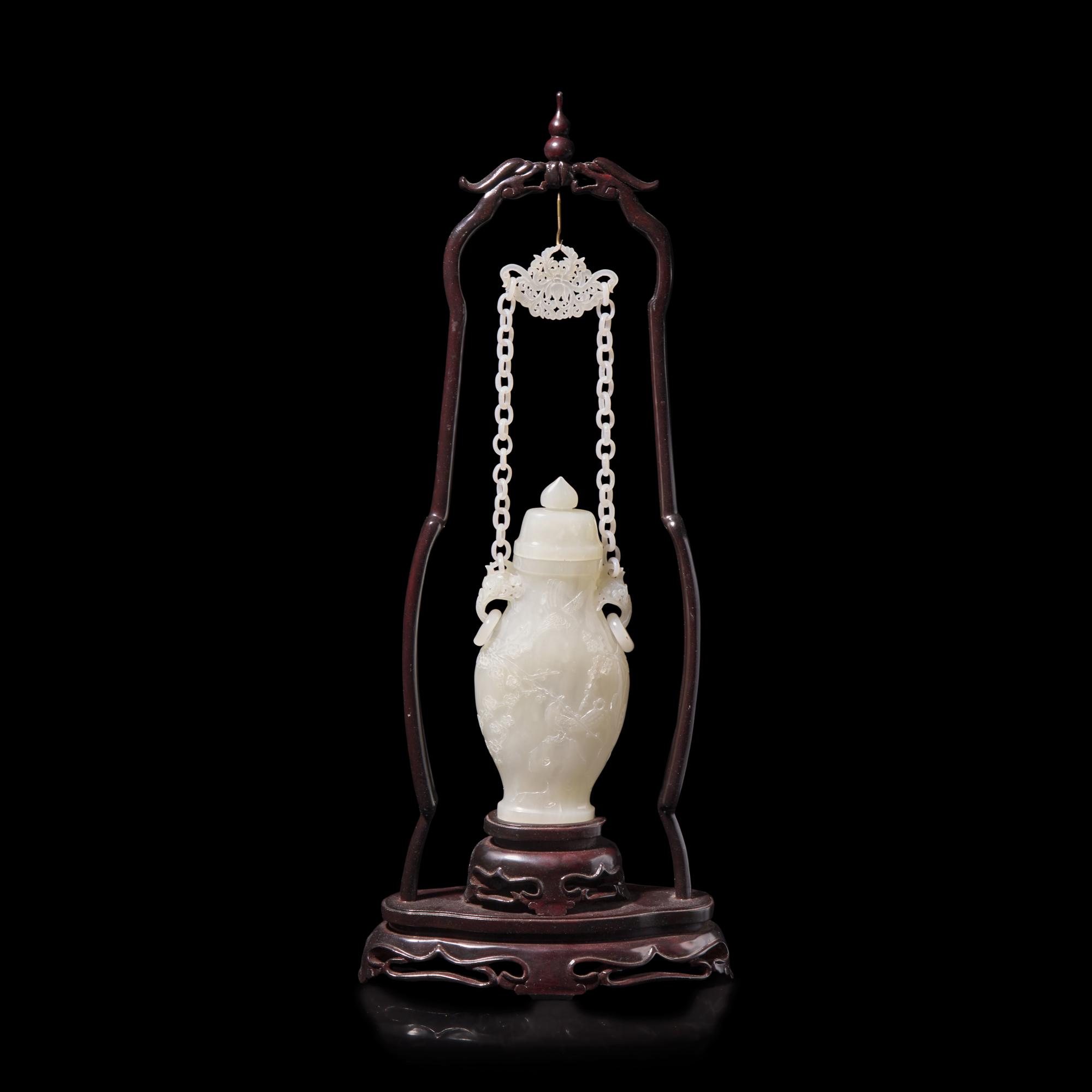 A Chinese Carved Jade Hanging Vase, 20th Century — 近代 花鳥紋玉鏈瓶
