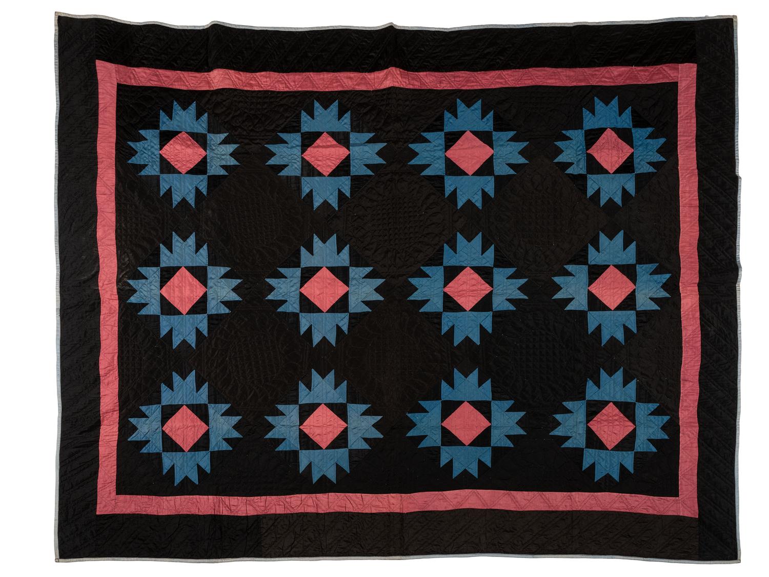 A Black, Blue and Red Star-Pattern Pieced Cotton Quilt
