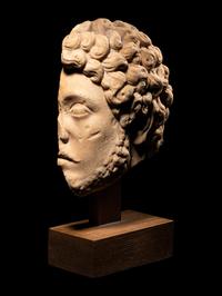 A Roman Marble Portrait Head of Marcus Aurelius from a Relief