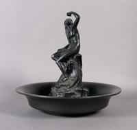 A Wedgwood Basalt Flower Frog and Bowl, Diameter 14 1/4 inches.