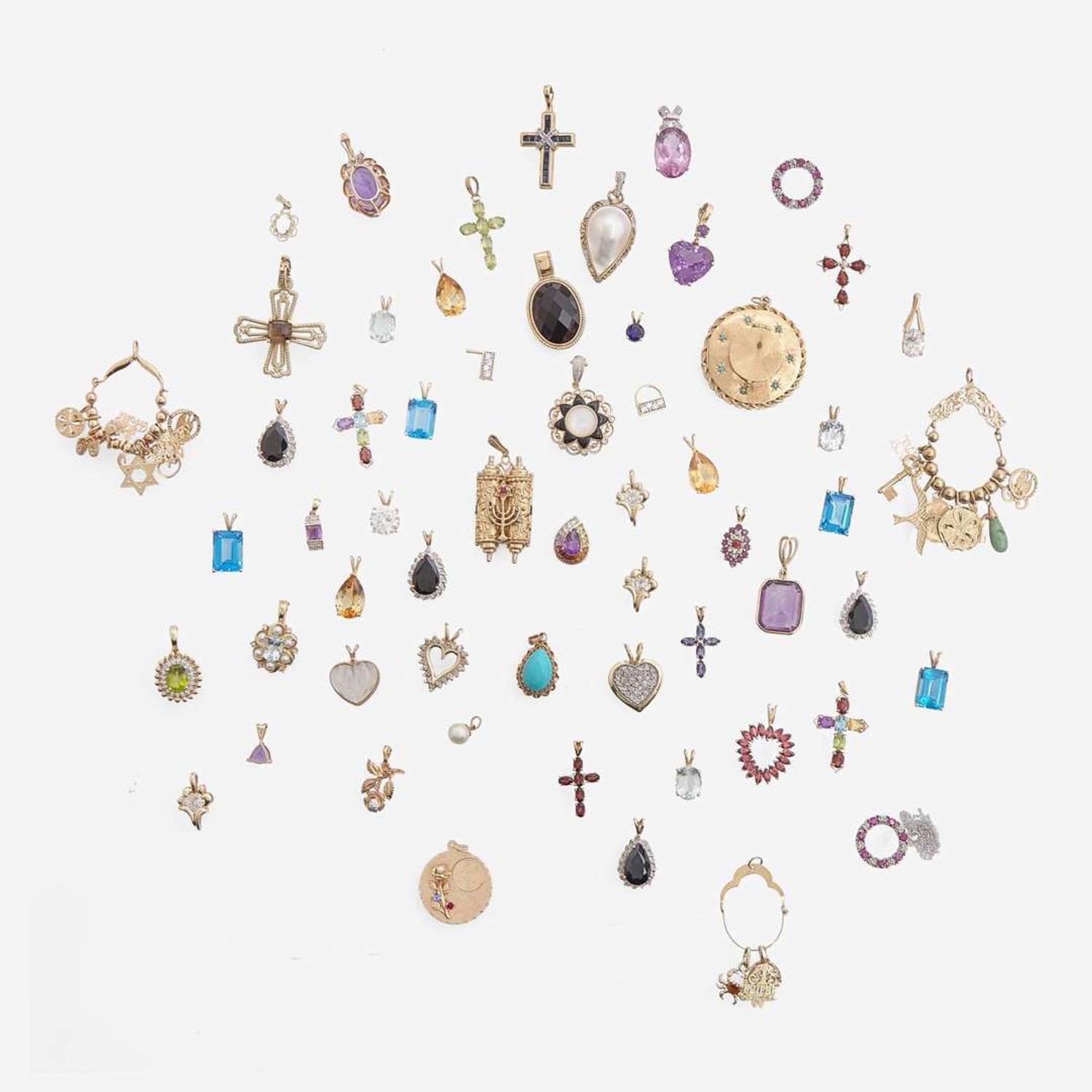 A Large Collection of 14K Gold and Gemstone Pendants