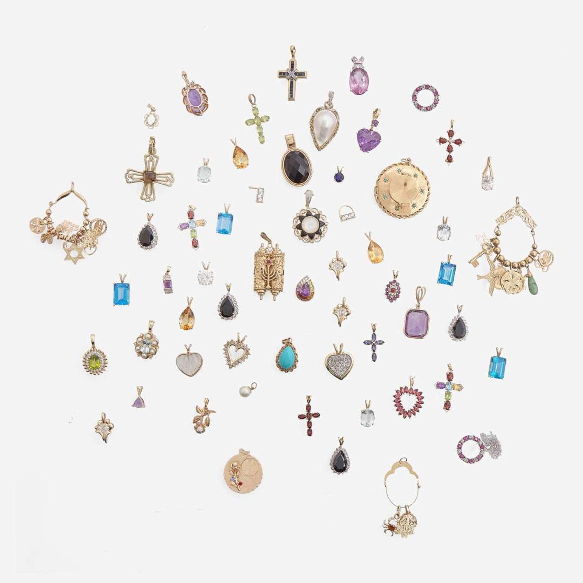 A Large Collection of 14K Gold and Gemstone Pendants