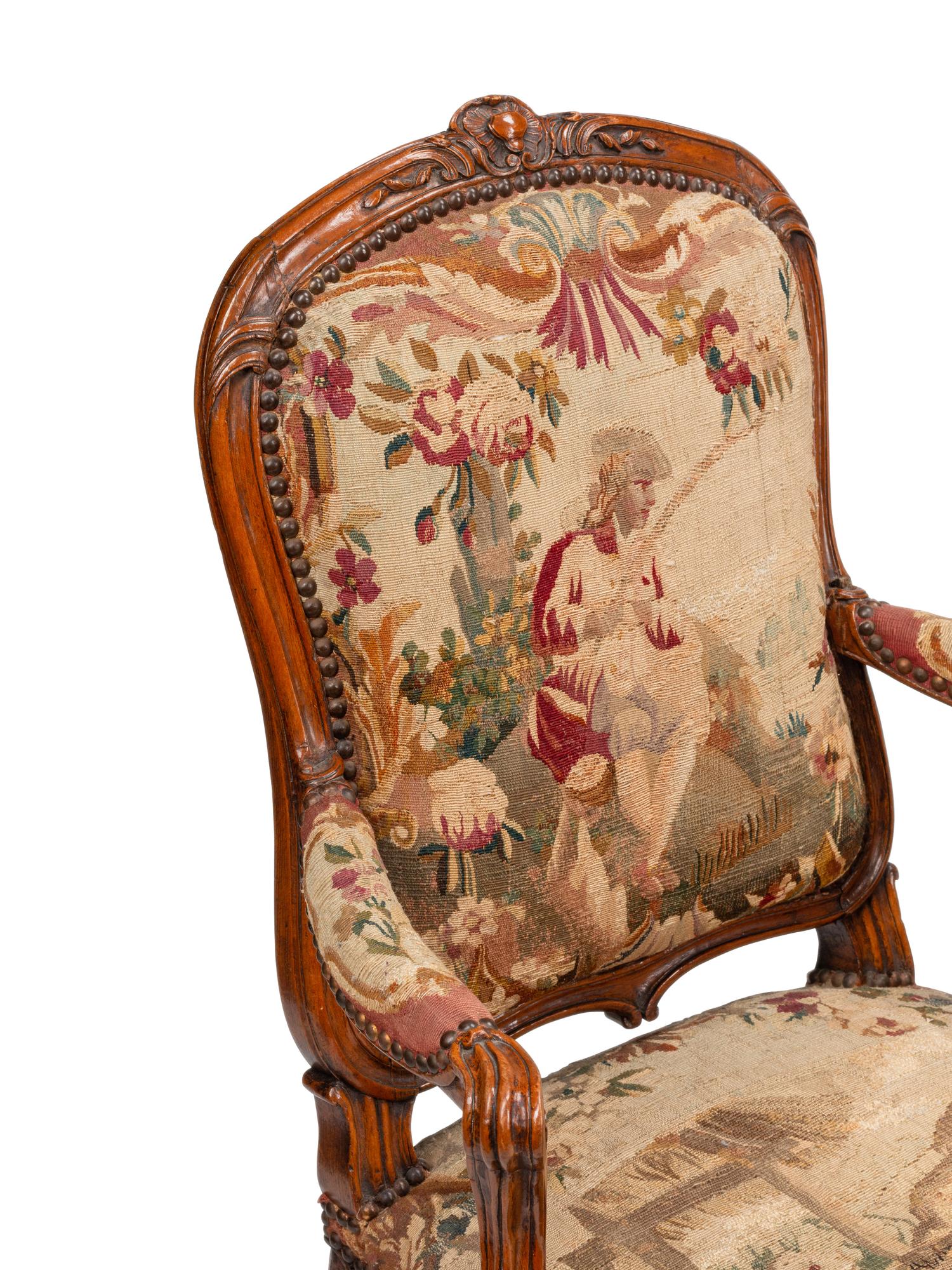 A Set of Four Louis XV Beechwood Fauteuils