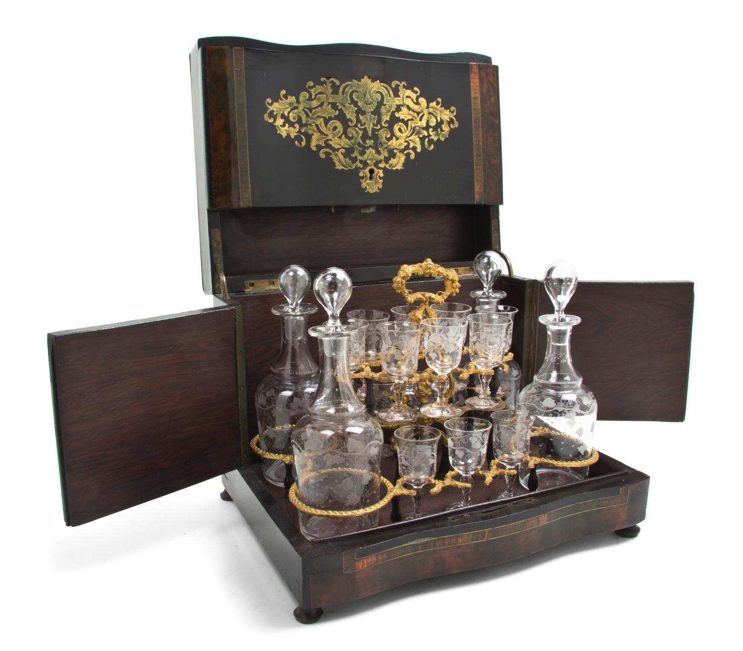 A Napoleon III Brass Inlaid Calamander Cave a Liqueur, Width 12 5/8 inches.