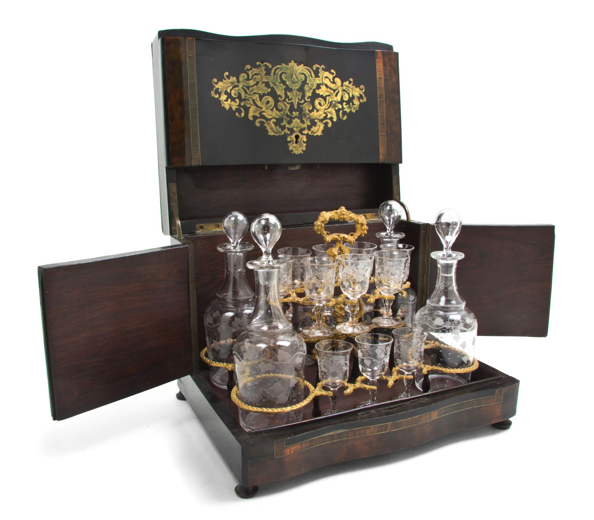 A Napoleon III Brass Inlaid Calamander Cave a Liqueur, Width 12 5/8 inches.