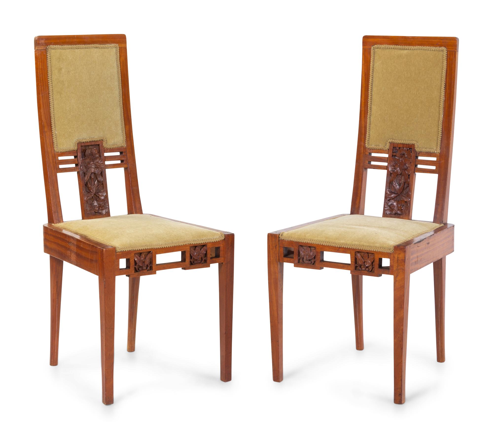 A Late Art Nouveau Table and Chairs
