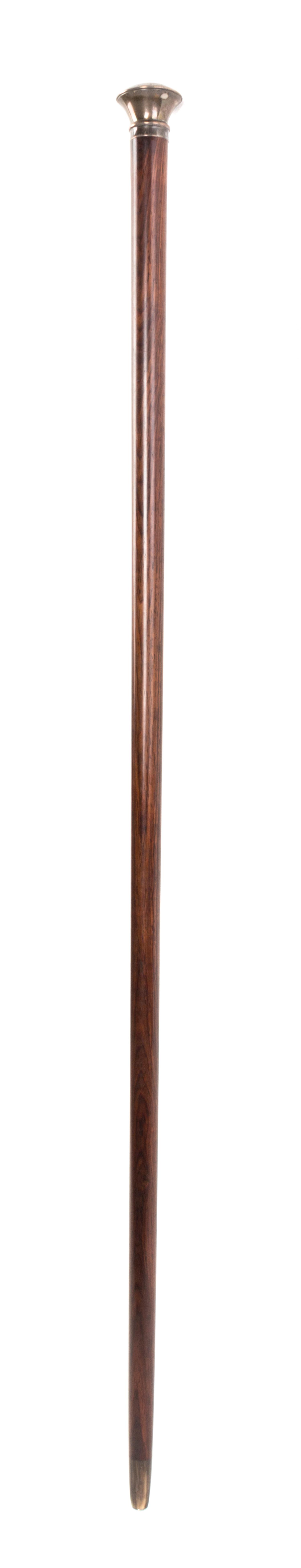 An American Sterling Silver Handled Walking Stick, Length of handle 1 3/8 x length overall 36 3/4 inches.