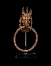 A Greek Bronze Handle with a Griffin Head