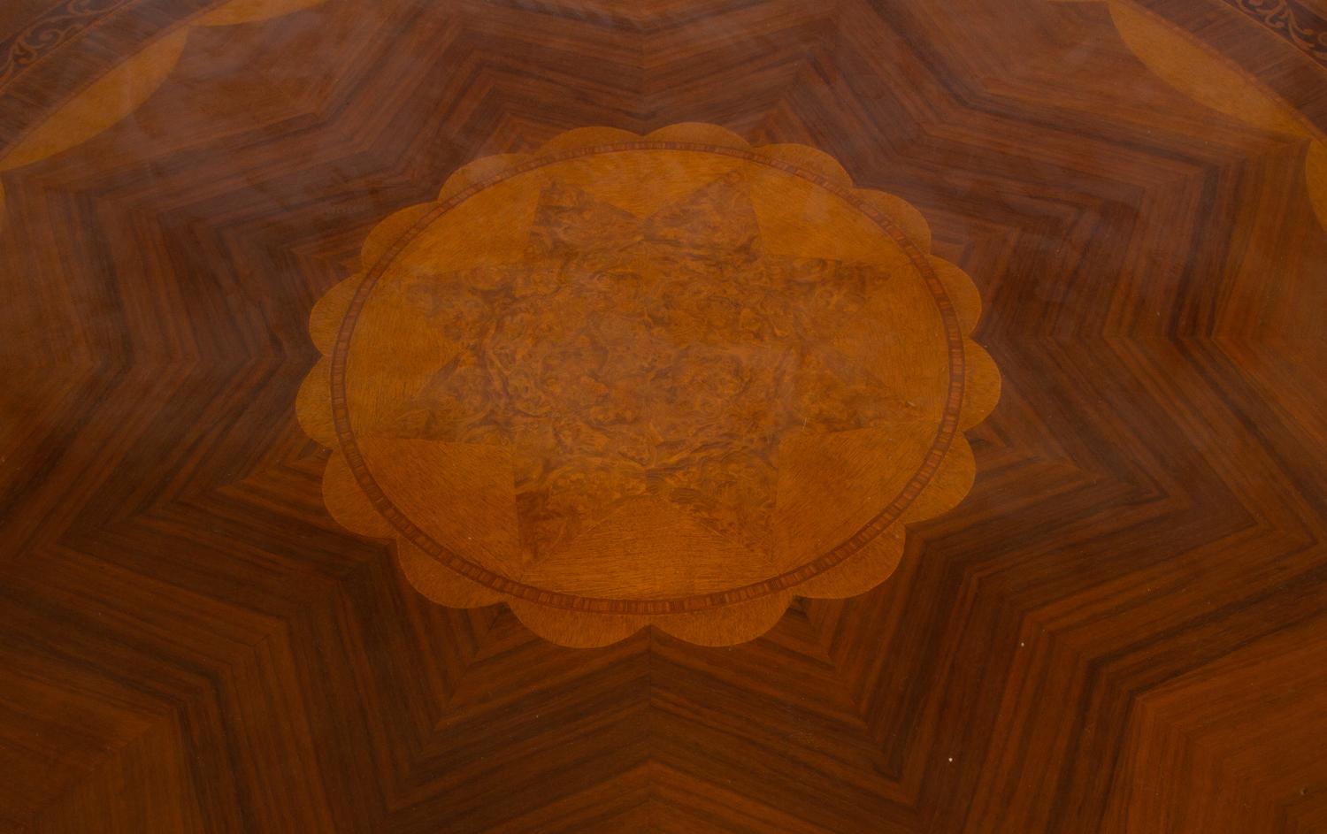 An Empire Style Inlaid Beechwood and Parcel Gilt Center Table by Hurtado