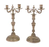 A Pair of Silvered Brass Two-Light Candelabra