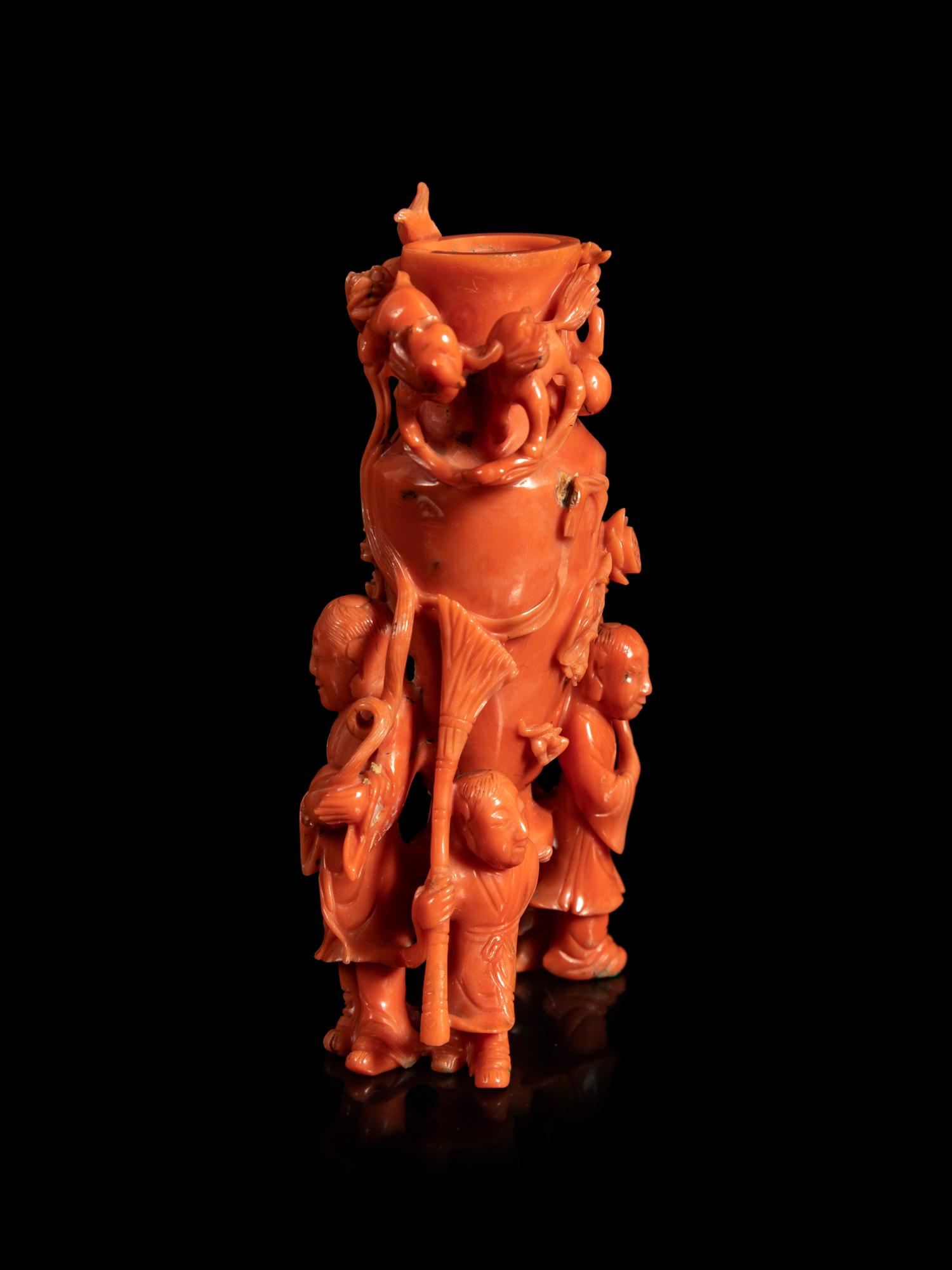 A Carved Red Coral 'Boy' Snuff Bottle